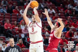 Nebraska Cornhuskers forward Berke Buyuktuncel (9) takes a shot against Indiana Hoosiers guard Trey Galloway (32) in the first half during a college basketball game Friday, December 13, 2024 in Lincoln, Nebraska. Photo by Jaelle Johnson.