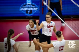 Nebraska Cornhuskers middle blocker Rebekah Allick (5) celebrats a point against the Wisconsin Badgers in the first set during the final regional match in the NCAA championship Sunday, December 15, 2024, in Lincoln, Nebraska. Photo by John S. Peterson.