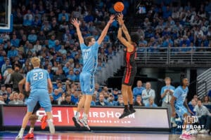 Creighton Bluejays Ryan Kalkbrenner contests a shot during a college basketball game against St John's Red Storm on Tuesday, December 31, 2024, in Omaha, Nebraska. Photo by Brandon Tiedemann.