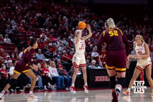 Nebraska Cornhuskers guard Britt Prince (23) makes a three point shot against the Minnesota Golden Gophers during a college basketball game Sunday, December 8, 2024, in Lincoln, Nebraska. Photo by John S. Peterson.