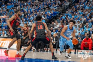 Creighton Bluejays Jasen Green drives to the hoop during a college basketball game against St John's Red Storm on Tuesday, December 31, 2024, in Omaha, Nebraska. Photo by Brandon Tiedemann.