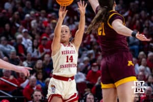 Nebraska Cornhuskers guard Callin Hake (14) makes a three point shot in the first half against the Minnesota Golden Gophers during a college basketball game Sunday, December 8, 2024, in Lincoln, Nebraska. Photo by John S. Peterson.