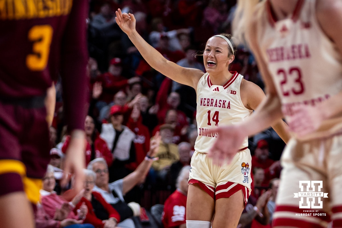 Nebraska Cornhuskers guard Callin Hake (14) celebrates making a three point shot against the Minnesota Golden Gophers in the first half during a college basketball game Sunday, December 8, 2024, in Lincoln, Nebraska. Photo by John S. Peterson.