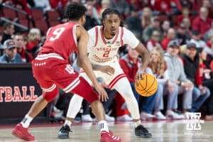 Nebraska Cornhuskers guard Ahron Ulis (2) dribbles the ball against Indiana Hoosiers guard Kanaan Carlyle (9) in the first half during a college basketball game Friday, December 13, 2024 in Lincoln, Nebraska. Photo by Jaelle Johnson.