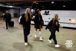 Nebraska Cornhuskers Andi Jackson, Harper Murray, and Laney Choboy arrive at the KFC Yum! Arena for practice and media day at the NCAA championships Wednesday, December 18, 2024, in Louisville, Kentucky. Photo by John S. Peterson.