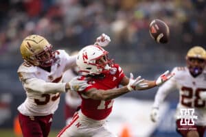 Nebraska Cornhuskers wide receiver Jacory Barney Jr. (17) is being held back by Boston College Eagles defensive back Ashton McShane (35) trying to make a catch during the Pinstripe Bowl game, Saturday, December 28, 2024, in New York, New York. Photo by John S. Peterson.