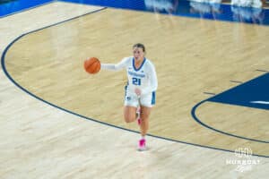 Creighton Bluejays Molly Mogensen pushes the ball up court during a college basketball game against the Wyoming Cowgirls on December 17th, 2024 in Omaha Nebraska. Photo by Brandon Tiedemann.