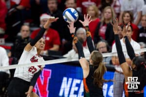 Nebraska Cornhuskers outside hitter Harper Murray (27) spikes the ball against the Miami Hurricanes during the second round of the NCAA volleyball tournament Saturday, December 7, 2024, in Lincoln, Nebraska. Photo by John S. Peterson.