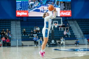 Creighton Bluejays Molly Mogensen shoots an open three during a college basketball game against the Wyoming Cowgirls on December 17th, 2024 in Omaha Nebraska. Photo by Brandon Tiedemann.