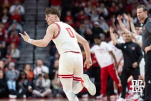 Nebraska Cornhuskers guard Connor Essegian (0) celebrates making a three point shot against the Indiana Hoosiers in the first half during a college basketball game Friday, December 13, 2024 in Lincoln, Nebraska. Photo by Jaelle Johnson.