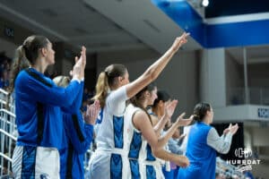 Creighton Bluejays bench celebrates during a college basketball game against the Wyoming Cowgirls on December 17th, 2024 in Omaha Nebraska. Photo by Brandon Tiedemann.