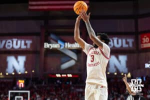 Nebraska Cornhuskers guard Brice Williams (3) makesa. three point shot against the Indiana Hoosiers in the first half during a college basketball game Friday, December 13, 2024 in Lincoln, Nebraska. Photo by Jaelle Johnson.