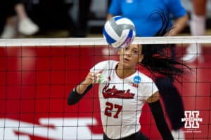 Nebraska Cornhuskers outside hitter Harper Murray (27) taps the ball over the net against the Miami Hurricanes during the second round of the NCAA volleyball tournament Saturday, December 7, 2024, in Lincoln, Nebraska. Photo by John S. Peterson.