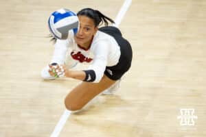 Nebraska Cornhuskers outside hitter Harper Murray (27) dives to save the ball against the Dayton Flyers in the first set during the first regional match in the NCAA championship Friday, December 13, 2024, in Lincoln, Nebraska. Photo by John S. Peterson.