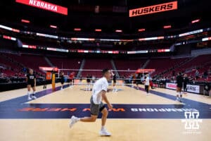 Nebraska Cornhuskers assistant coach Jaylen Reyes runs across the court during practice at the NCAA championships Wednesday, December 18, 2024, in Louisville, Kentucky. Photo by John S. Peterson.