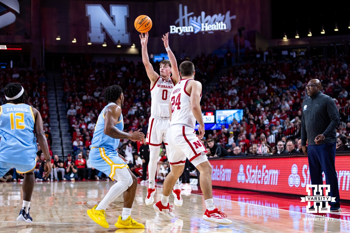 Nebraska Cornhuskers guard Connor Essegian (0) makes a three-point shto against the Southern University Jaguars in teh first half during college basketball game, Monday, December 30, 2024, in Lincoln, Nebraska. Photo by John S. Peterson.