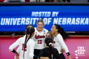 Nebraska Cornhuskers huddle up to celebrate a point against the Florida A&M Rattlers in the second set during the first round of the NCAA volleyball tournament Friday, December 6, 2024, in Lincoln, Nebraska. Photo by John S. Peterson.