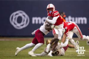 Nebraska Cornhuskers running back Rahmir Johnson (14) runs with the ball against Boston College Eagles linebacker Bryce Steele (2) during the Pinstripe Bowl game, Saturday, December 28, 2024, in New York, New York. Photo by John S. Peterson.