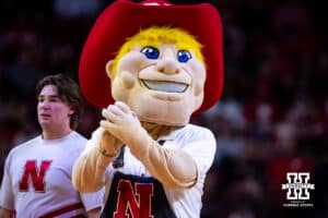 Nebraska Cornhuskers mascot Herbie firing oup the crowd against the Southern University Jaguars during college basketball game, Monday, December 30, 2024, in Lincoln, Nebraska. Photo by John S. Peterson.