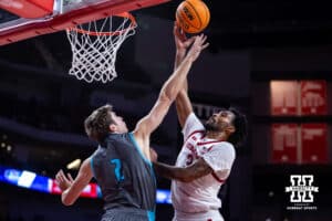 Nebraska Cornhuskers guard Brice Williams (3) makes a layup against North Florida Ospreys guard Nate Lliteras (2) in the first half during a college basketball game Sunday, December 1, 2024, in Lincoln, Nebraska. Photo by John S. Peterson.