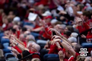 Nebraska Cornhuskers fans celebrate a block against the Miami Hurricanes during the second round of the NCAA volleyball tournament Saturday, December 7, 2024, in Lincoln, Nebraska. Photo by John S. Peterson.