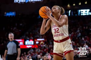 Nebraska Cornhuskers forward Kendall Coley (32) makes a three point shot against the Minnesota Golden Gophers during a college basketball game Sunday, December 8, 2024, in Lincoln, Nebraska. Photo by John S. Peterson.