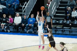 Creighton Bluejays Morgan Maly shoots a jumper during a college basketball game against the Wyoming Cowgirls on December 17th, 2024 in Omaha Nebraska. Photo by Brandon Tiedemann.