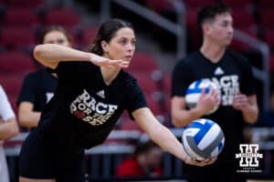 Nebraska Cornhuskers Merritt Beason serves the ball during practice at the NCAA championships Wednesday, December 18, 2024, in Louisville, Kentucky. Photo by John S. Peterson.