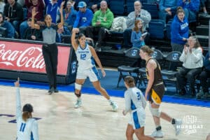 Creighton Bluejays Jayme Horan after a three pointer during a college basketball game against the Wyoming Cowgirls on December 17th, 2024 in Omaha Nebraska. Photo by Brandon Tiedemann.