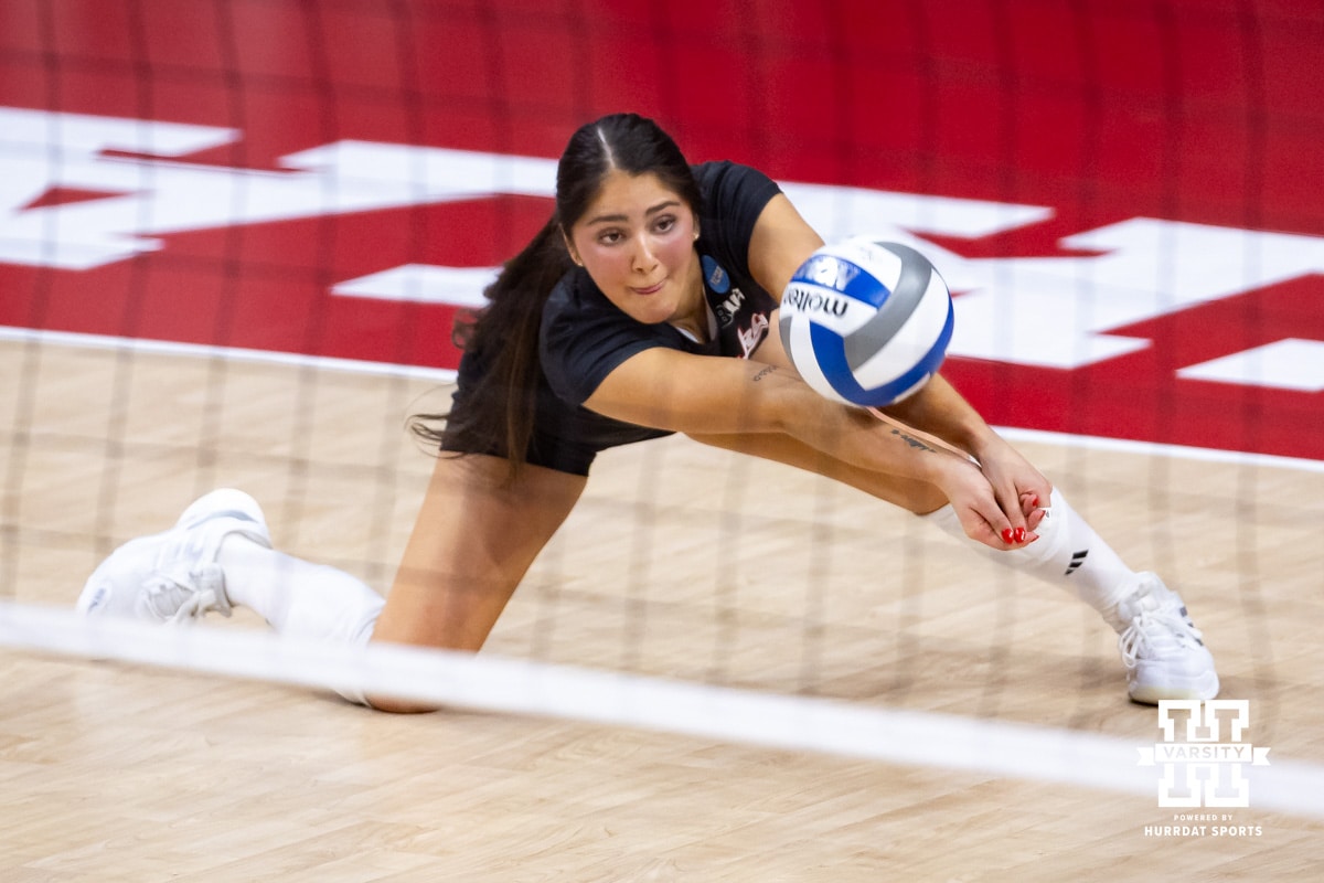 Nebraska volleyball libero Lexi Rodriguez (8) digs the ball against the Miami Hurricanes during the second round of the NCAA volleyball tournament Saturday, December 7, 2024, in Lincoln, Nebraska. Photo by John S. Peterson.