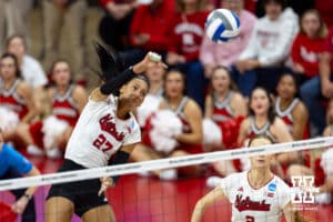 Nebraska Cornhuskers outside hitter Harper Murray (27) spikes the ball against the Wisconsin Badgers during the final regional match in the NCAA championship Sunday, December 15, 2024, in Lincoln, Nebraska. Photo by John S. Peterson.