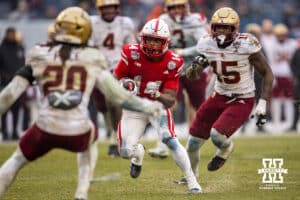 Nebraska Cornhuskers running back Rahmir Johnson (14) runs with the ball against the Boston College Eagles during the Pinstripe Bowl game, Saturday, December 28, 2024, in New York, New York. Photo by John S. Peterson.