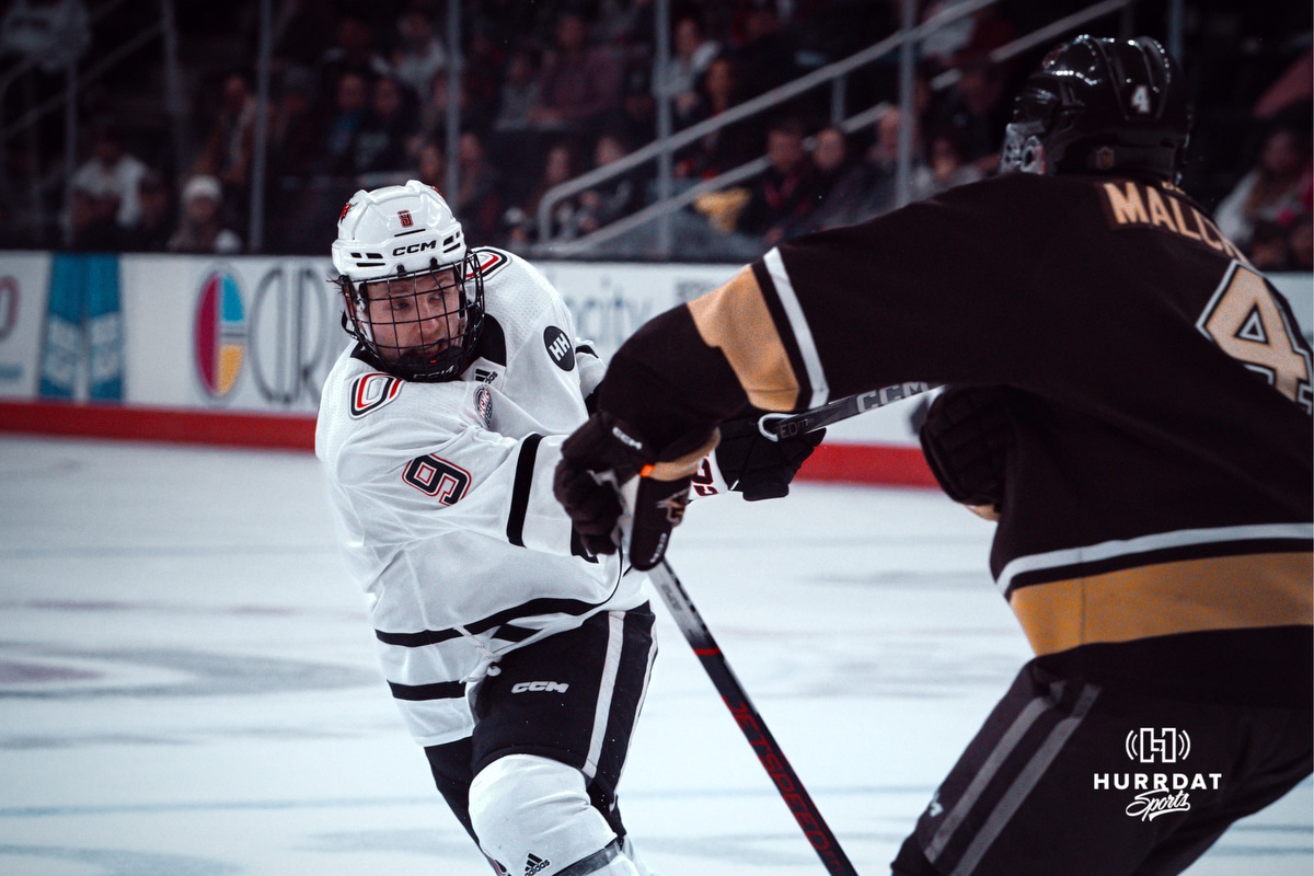 UNO Mavericks player, Brady Risk, takes a shot at the goal during a college hockey game on Dec 29, 2024 in Omaha, Nebraska. Photo by Logan Hock