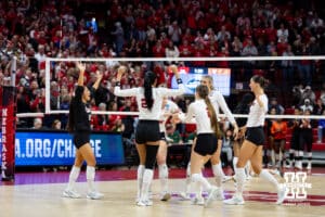 Nebraska Cornhuskers celebrates match point against the Florida A&M Rattlers in the third set during the first round of the NCAA volleyball tournament Friday, December 6, 2024, in Lincoln, Nebraska. Photo by John S. Peterson.