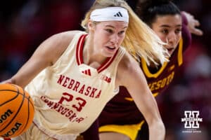 Nebraska Cornhuskers guard Britt Prince (23) dribbles the ball down the court against the Minnesota Golden Gophers during a college basketball game Sunday, December 8, 2024, in Lincoln, Nebraska. Photo by John S. Peterson.