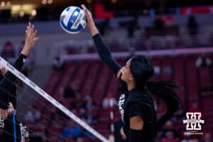 Nebraska Cornhuskers outside hitter Harper Murray spikes the ball during practice at the NCAA championships Wednesday, December 18, 2024, in Louisville, Kentucky. Photo by John S. Peterson.