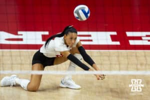 Nebraska Cornhuskers outside hitter Harper Murray (27) digs the ball against the Wisconsin Badgers in the second set during the final regional match in the NCAA championship Sunday, December 15, 2024, in Lincoln, Nebraska. Photo by John S. Peterson.