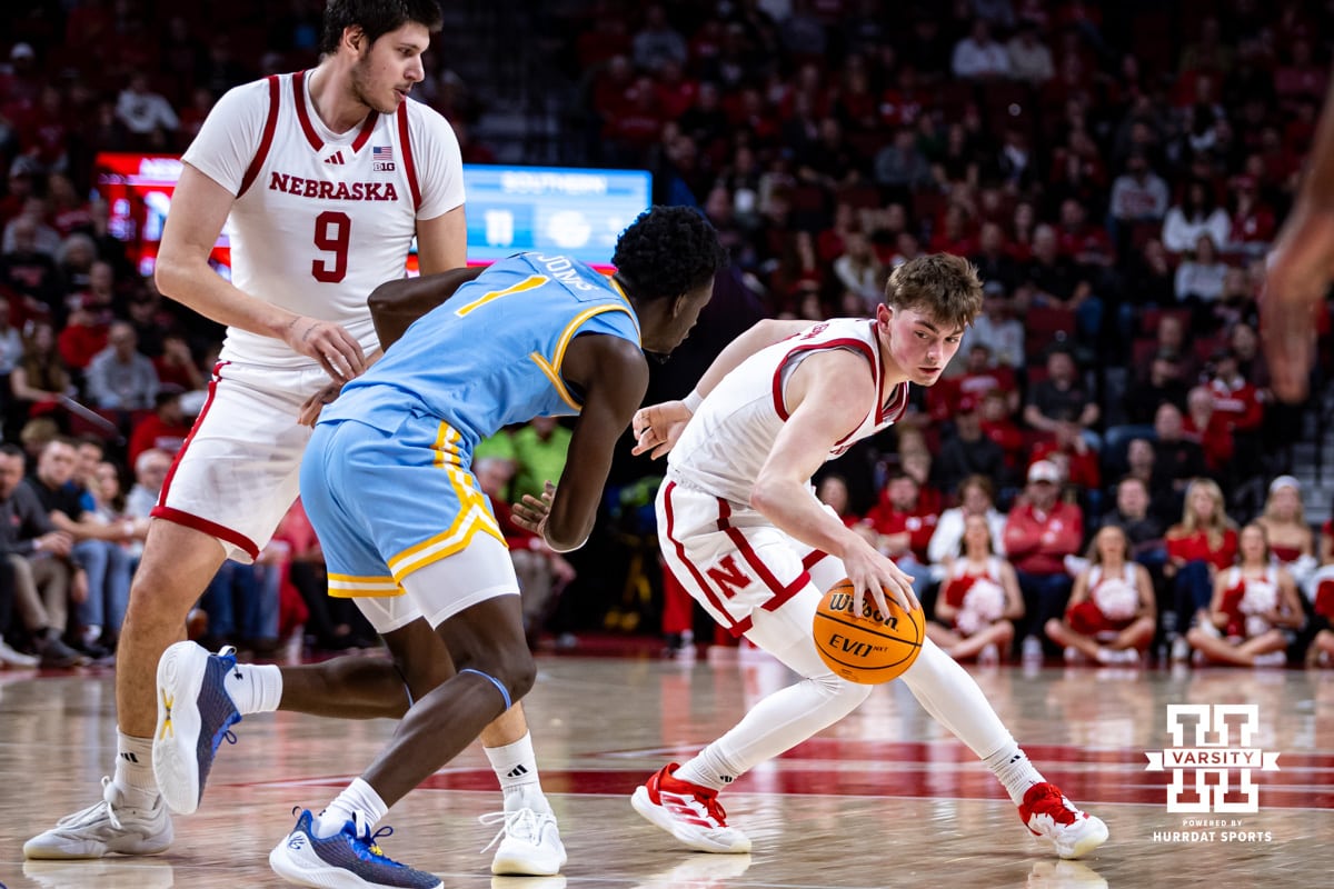 Nebraska Cornhuskers guard Connor Essegian (0) dribbles the ball against Southern University Jaguars forward DaMariee Jones (1) in the first half during college basketball game, Monday, December 30, 2024, in Lincoln, Nebraska. Photo by John S. Peterson.