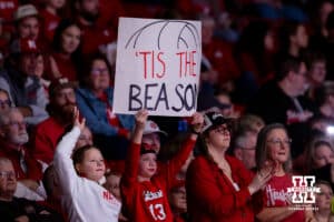 Nebraska Cornhuskers fans holding a sign against the Miami Hurricanes during the second round of the NCAA volleyball tournament Saturday, December 7, 2024, in Lincoln, Nebraska. Photo by John S. Peterson.