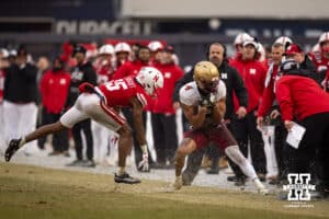 Nebraska Cornhuskers defensive back Ceyair Wright (15) pushes Boston College Eagles wide receiver Reed Harris (4) out-of-bounds when trying to make a catch during the Pinstripe Bowl game, Saturday, December 28, 2024, in New York, New York. Photo by John S. Peterson.