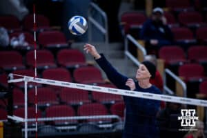 Penn State Nittany Lions head coach Katie Schumacher-Cawley spikes the ball during practice at the NCAA championships Wednesday, December 18, 2024, in Louisville, Kentucky. Photo by John S. Peterson.