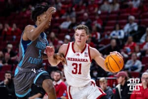 Nebraska Cornhuskers guard Cale Jacobsen (31) drives to the basket against North Florida Ospreys guard Dante Oliver (5) in the second half during a college basketball game Sunday, December 1, 2024, in Lincoln, Nebraska. Photo by John S. Peterson.