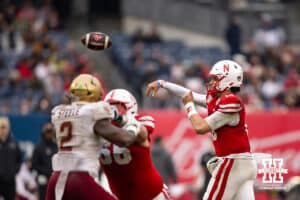 Nebraska Cornhuskers quarterback Dylan Raiola (15) throws a pass to Emmett Johnson (21) for a touchdown against the Boston College Eagles during the Pinstripe Bowl game, Saturday, December 28, 2024, in New York, New York. Photo by John S. Peterson.