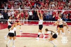 Nebraska Cornhuskers win match point against the Wisconsin Badgers in three set during the final regional match in the NCAA championship Sunday, December 15, 2024, in Lincoln, Nebraska. Photo by John S. Peterson.