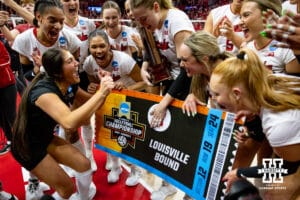 Nebraska Cornhuskers libero Lexi Rodriguez (8) punched the ticket to go to Louisville for the final four after the win over the Wisconsin Badgers during the second regional match in the NCAA championship Sunday, December 15, 2024, in Lincoln, Nebraska. Photo by John S. Peterson.