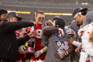 Nebraska Cornhuskers running back Rahmir Johnson (14) gets emotional after receiving the MVP trophy after the win over the Boston College Eagles during the Pinstripe Bowl game, Saturday, December 28, 2024, in New York, New York. Photo by John S. Peterson.