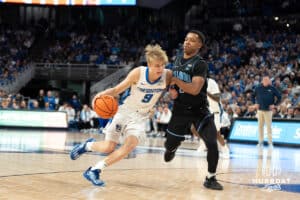 Creighton Bluejays Ty Davis (9) drives to the hoop during a college basketball game against the Villanova Wildcats on Saturday, December 21st, 2024 in Omaha Nebraska. Photo by Brandon Tiedemann.