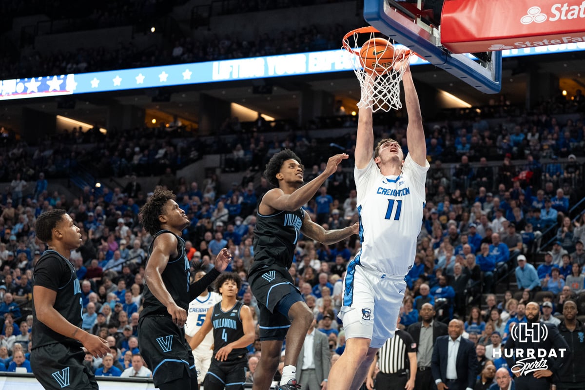 Creighton Bluejays Ryan Kalkbrenner (11) drives to the hoop and dunks.during a college basketball game against the Villanova Wildcats on Saturday, December 21st, 2024 in Omaha Nebraska. Photo by Brandon Tiedemann.