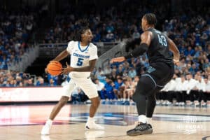 Creighton Bluejays Jamiya Neal (5) looks to pas the ball during a college basketball game against the Villanova Wildcats on Saturday, December 21st, 2024 in Omaha Nebraska. Photo by Brandon Tiedemann.