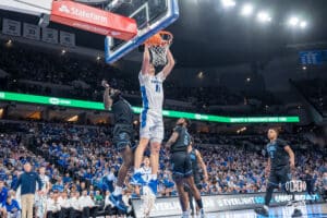 Creighton Bluejays Ryan Kalkbrenner (11) dunks against the Villanova Wildcats during a college basketball game on Saturday, December 21st, 2024 in Omaha Nebraska. Photo by Brandon Tiedemann.